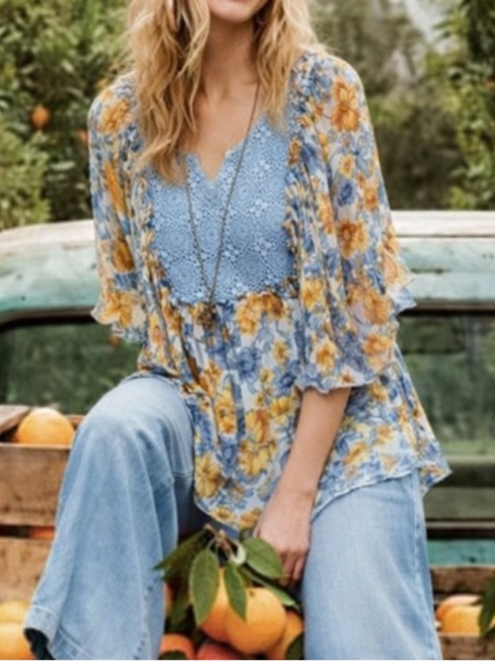 Anthropologie Blue Tassel Blue Floral Top
